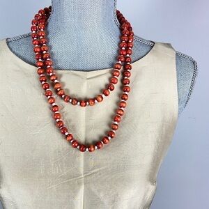 Vintage wood bead long strand necklace orange brown tone.